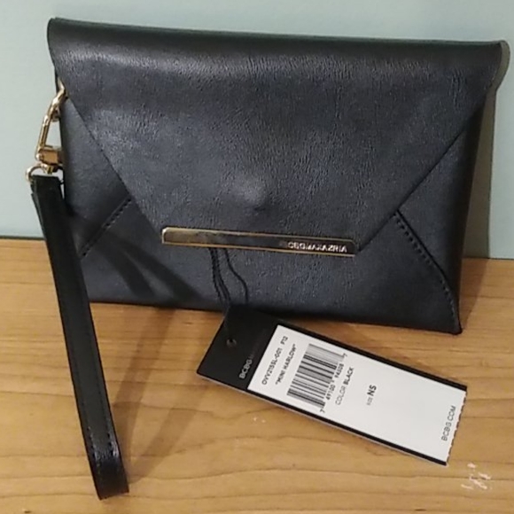 BCBGMaxAzria Handbags - *NWT* BCBG MAXAZRIA navy blue wristlet
